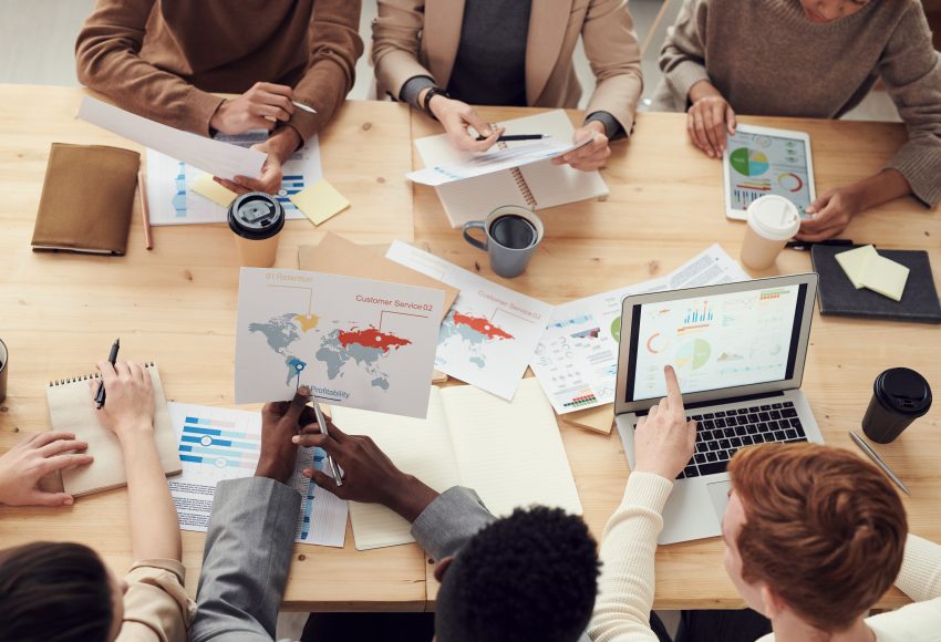 Content strategy meeting between business owners and marketing team