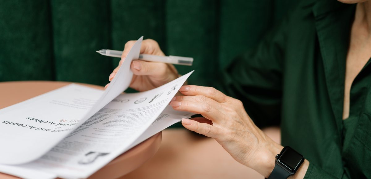 Business owner reviewing approval konten marketing