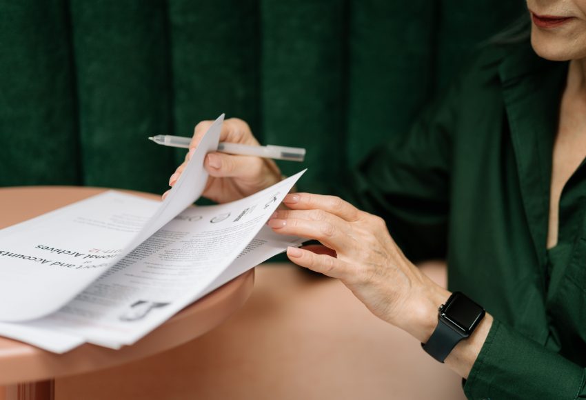 Business owner reviewing approval konten marketing